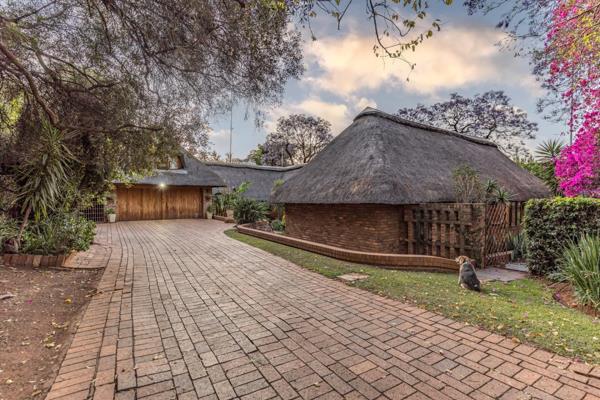 Located in the prestigious and secure Waterkloof area, this 65-year-old heritage thatch ...