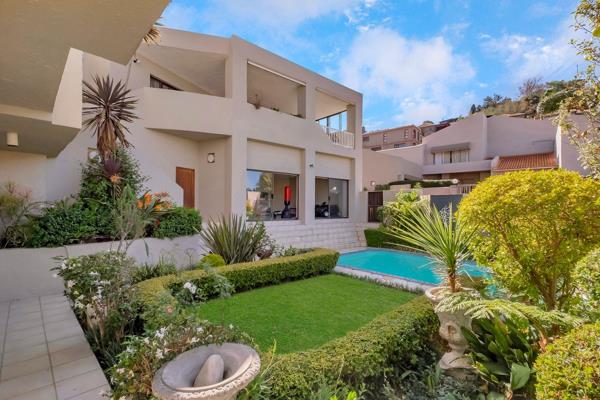 Stunning Triple-Story Home in sought after estate

Nestled in the sought-after The Palms Estate, Constantia Kloof, this impressive ...