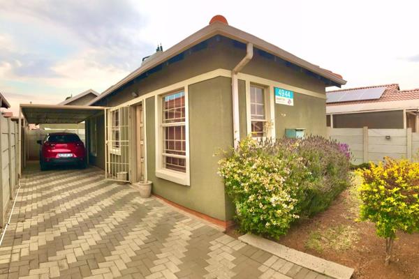 This beautiful family home is located in a secure estate in Leopard Rest, Alberton. It ...