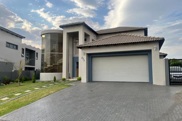 Stunning 5-Bedroom Home with a Pool and Beautiful Garden

Welcome to this spacious and modern 5-bedroom home, perfectly designed for ...