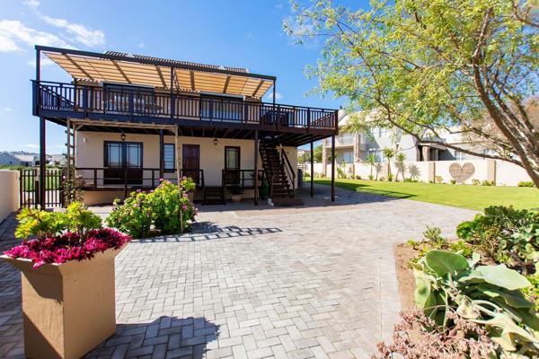 This well-priced property in prestigious Myburgh Park is currently a successful self-catering holiday home. It&#39;s just a 5-minute ...