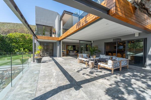 Welcome to this luxurious 5-bedroom family home nestled high in Fresnaye, designed for seamless indoor-outdoor living. Perfect for ...