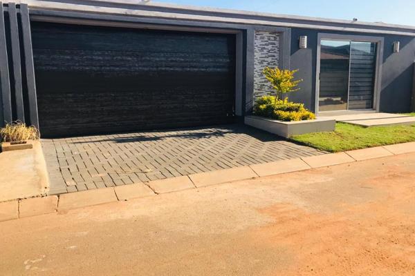 3-bedroom house with 2 bathrooms, dining, lounge, kitchen fully fitted, carport and garage.