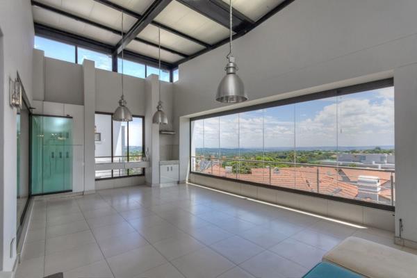 This outstanding  exclusive luxurious bright with entrance skylights  , spacious and magnificent  residence in upmarket Morningside ...