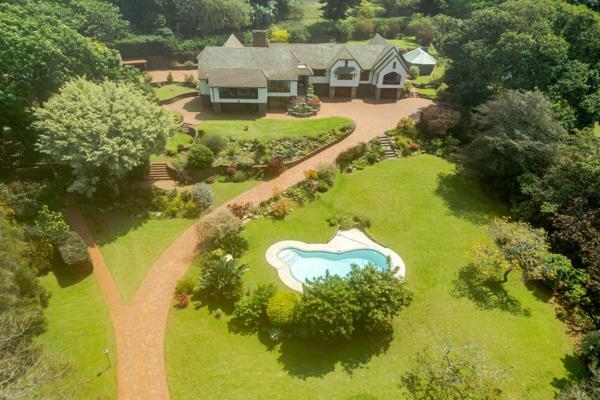 This 4994m&#178; property presents as a traditional Upper Durban North home with a pristine garden, stunning views, and a sparkling ...