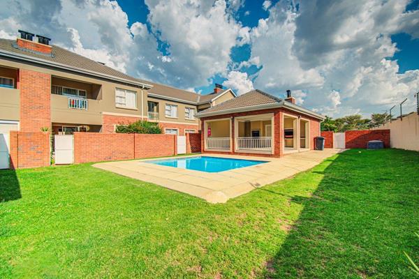 Entrance hall and lounge leading to a covered patio and the garden
Kitchen with granite tops and sufficient cupboard space
2 ...