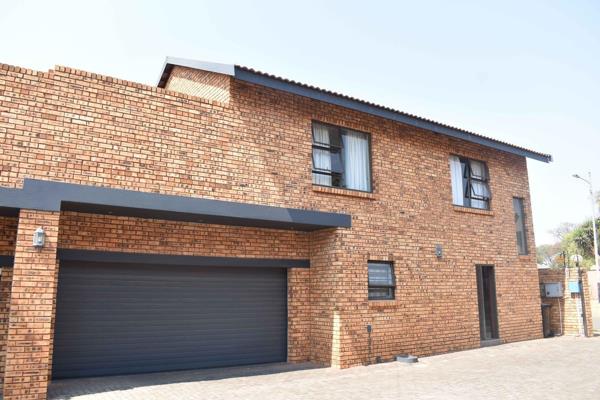 Modern Facebrick Duplex in Exclusive Complex. This spacious and modern facebrick duplex ...