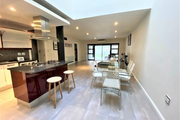 This excellent property has a gorgeous and  spacious tiled open plan lounge/dining area. ...