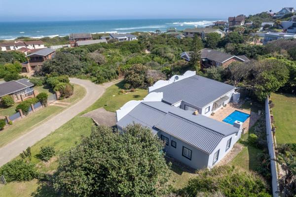 Located within walking distance of Port Alfred&#39;s West Beach, this divine family home ...