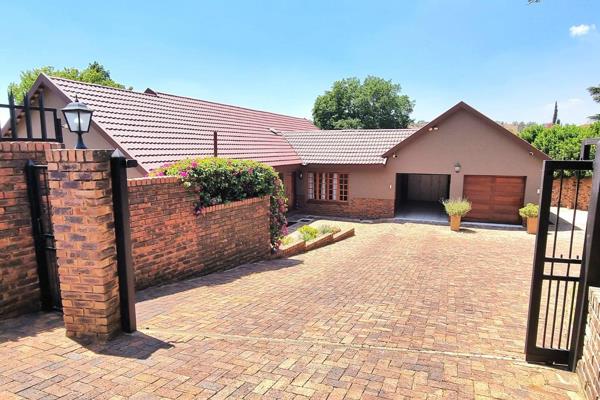 A Beautiful Semi-Face Brick Home with a Garden Flat and Pool in the Heart of Noordheuwel ...