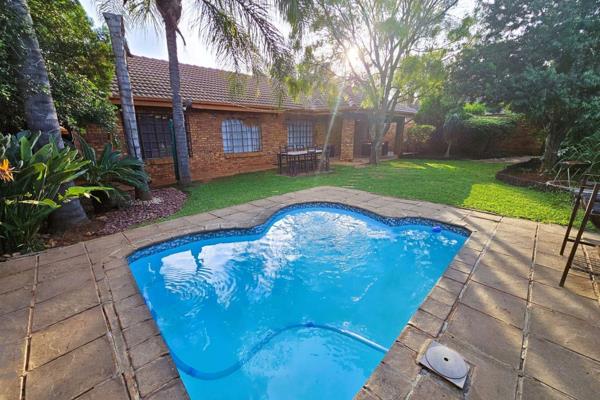 Well, maintained, spacious family home featuring open plan living areas that lead onto an undercover patio and braai area, overlooking ...