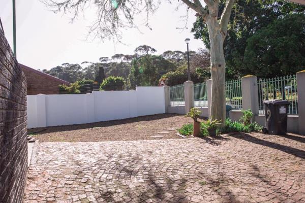 This is a spacious four-bedroom, two-bath house in Parow North, Cape Town, with a splash ...