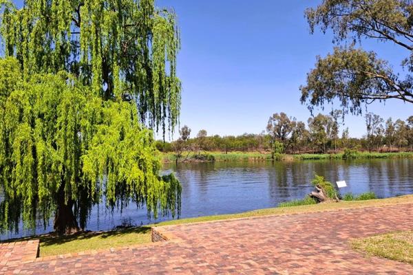 This exceptional vacant stand, located within a secure estate on the banks of the Vaal River, offers the perfect opportunity to build ...