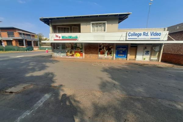 A double story building comprising 4 shops and 4 residential apartments, parking bays ...