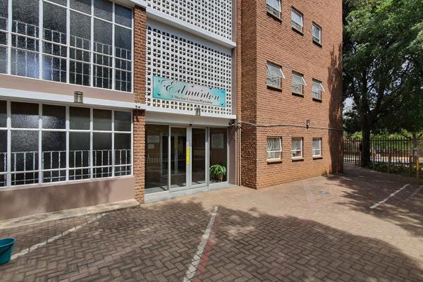 Ground floor apartment featuring a spacious open-plan lounge and dining area. 
This unit offers two bedrooms, or alternatively, one ...