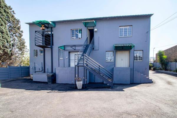 Four separate buildings consisting of the main double storey building, small storeroom, domestic accommodation and house.  

Situated ...