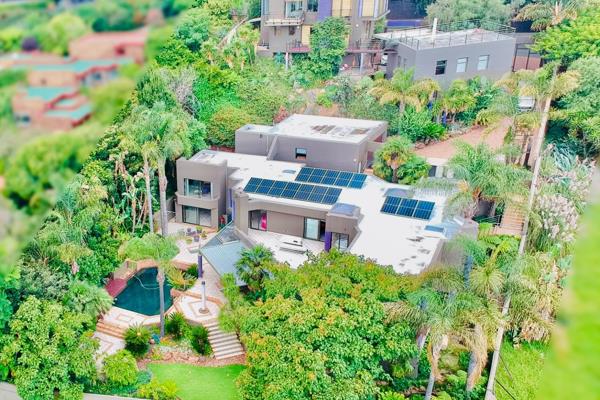 Perched atop Northcliff Hill, within the exclusive and secure Eco Estate, lies a breathtaking haven of luxury and tranquility. This ...