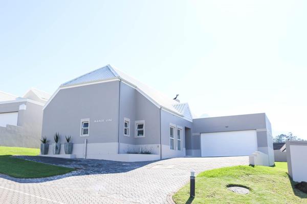 Very nice modern 3 bedroomed, 2 bathroom house  with an open plan kitchen/ lounge/ dining room area, Double garage with built in braai ...