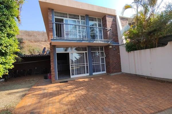 Step into this charming corner unit, perfectly positioned next to the communal pool in ...