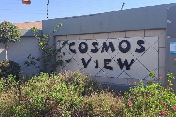 Welcome to your new home in Cosmos View Estate, nestled in the vibrant community of Kosmosdal, Gauteng, South Africa. This charming ...