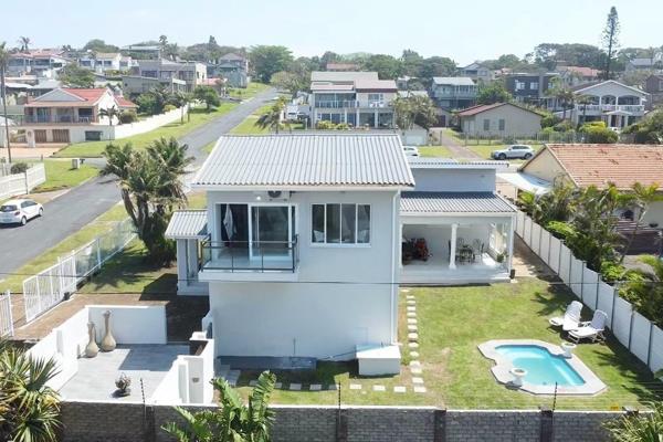 Welcome to this impeccably renovated home, where contemporary design meets serene coastal living. Upon entry, you&#39;re welcomed by an ...