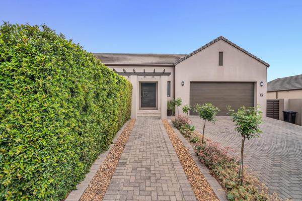 Welcome to this exquisite home in the highly sought-after Paryskloof Estate. Designed ...