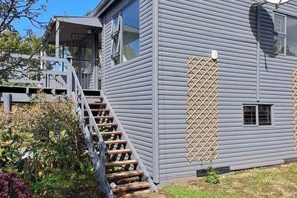 This sunny 3-bedroom beachside home is perfect for coastal living! It features a ...