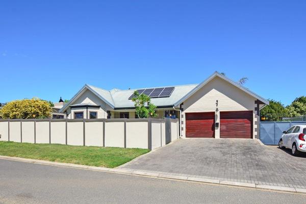 This charming 3-bedroom, 2-bathroom home offers open-plan living areas that flow ...