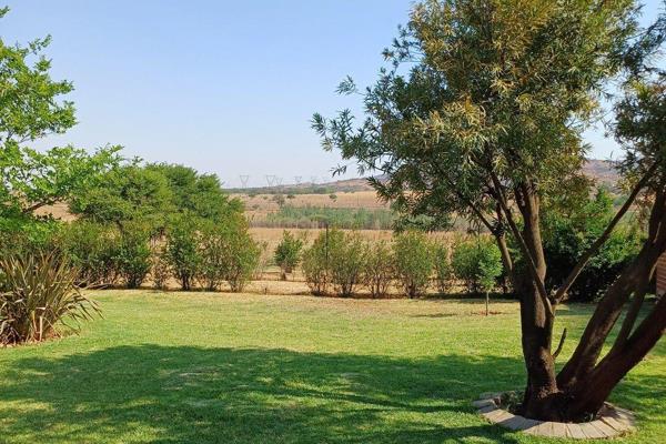 Situated on a stunning 1.4-hectare farm along a prominent main road, this exceptional property offers breathtaking views of the ...