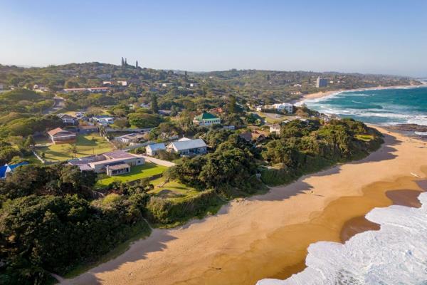 This expansive beach house, located in Umtentweni on the KZN South Coast, offers a ...