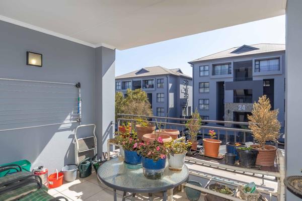 Entrance hall, dining area and lounge leading onto a covered balcony
Kitchen with appliances included, granite tops and a gas stove
3 ...