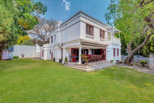 A tree-lined driveway immediately captivates with its beauty, perfectly complementing the home and its charming front garden. The ...