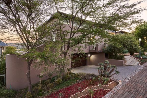 Located in the very corner of the Waterfall Village, this modern home enjoys slight ...