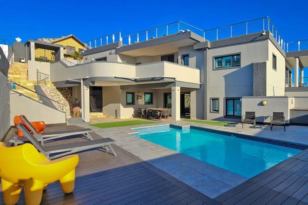 A two-storey Villa with a rooftop terrace wrapped within Table Bay sea views, offers a private pool, five bedrooms, all en-suite and ...