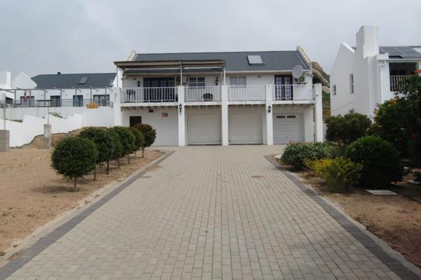 Two bedroomed double story home for sale with unobstructed ocean views!!

This two ...