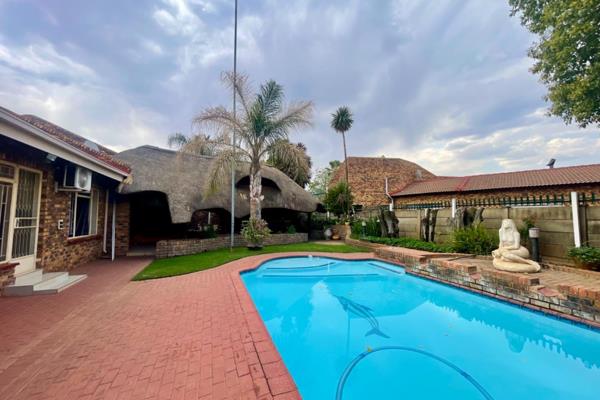 This beautifully designed, low-maintenance face brick house is the epitome of modern living, offering everything a family could dream ...