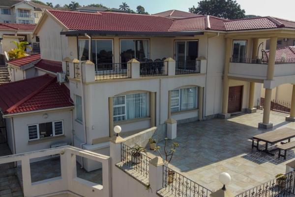 This executive home in Durban North boasts multiple reception rooms and balconies with stunning sea views, perfect for relaxing and ...