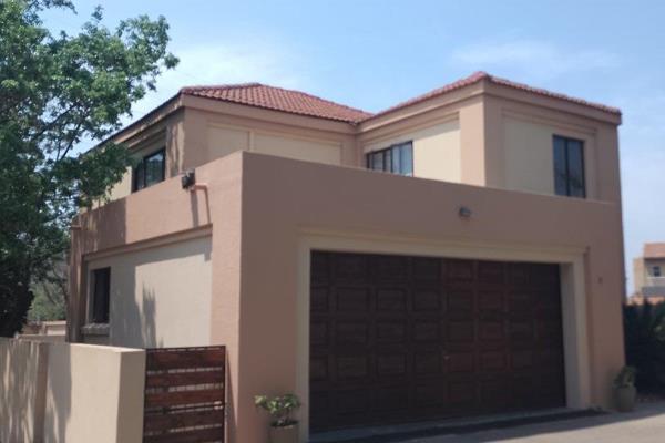 The Home Features:

- 3 spacious bedrooms, master with en-suite bathroom
- Lounge and ...