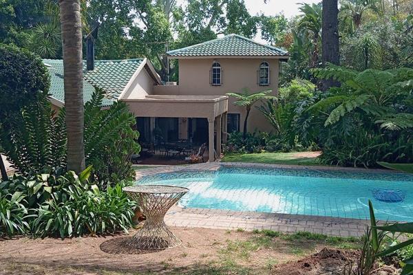 This spacious and neat home is surrounded by a landscaped, tropical forest and is situated in one of the most beautiful suburbs in ...