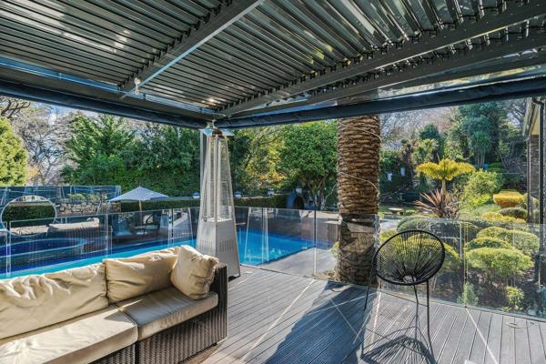 Situated in the distinguished Bishopscourt neighborhood, this refined contemporary residence offers a sophisticated living experience. ...