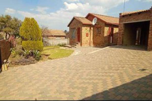 A charming three-bedroom house for sale at Tembisa next to Rabie ridge, offering a ...