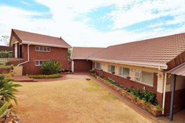 A Sunnyridge Sanctuary

Entrance Hall: As you enter this inviting home you are greeted ...