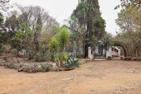 Enter through the remote controlled gate and the bulk of the garden is left to its ...