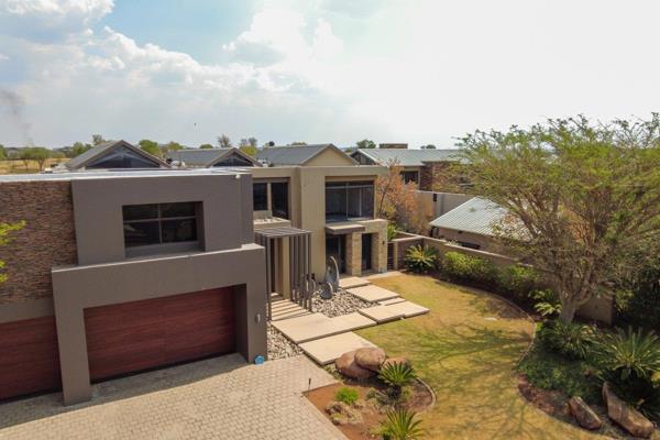 Step into luxury with this stunning home, were an expansive open plan living area flows seamlessly into covered entertainment space ...