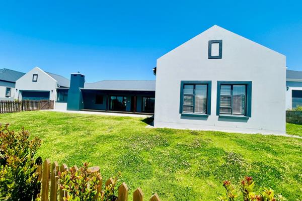 Located in the desirable Kraaibosch Country Estate, this home combines modern style with ...