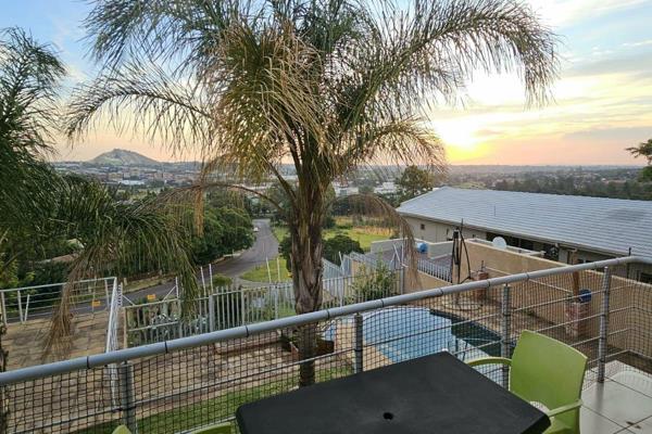 Nestled in the prestigious suburb of Monument, Krugersdorp, this expansive, modern ...