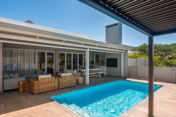 Luxury family home in Simbithi Eco Estate. This ultra-modern home comprises of an open ...