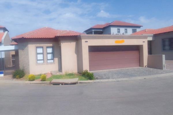 Offers a fully fitted kitchen with modern finishes. A built in SMEG gas stove available to save on electricity costs. 
The fairly spacious living area boasts with ice white ceramic floor tiles leading to a covered patio and a braai area for family bonding sessions and guests ...