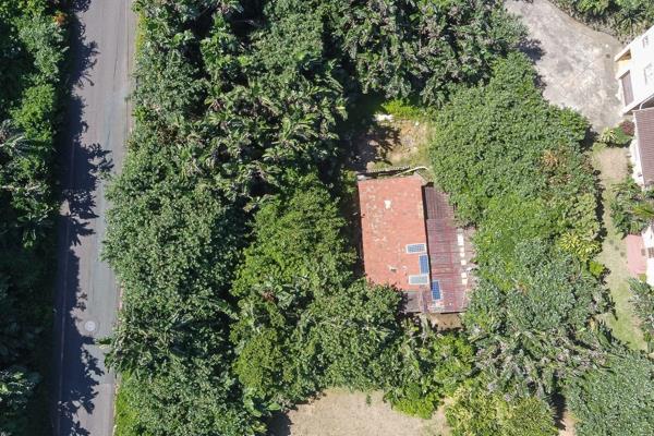 Calling investors &amp; developers

Land and deteriorated building on descending land, right on the Exclusive area of Garvies Beach ...