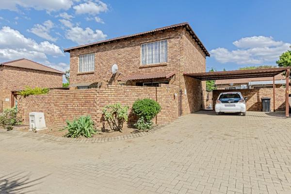 Walking Distance from Retail Crossing and Leroy&#39;s,  This charming two-bedroom, face brick townhouse is the perfect blend of comfort ...